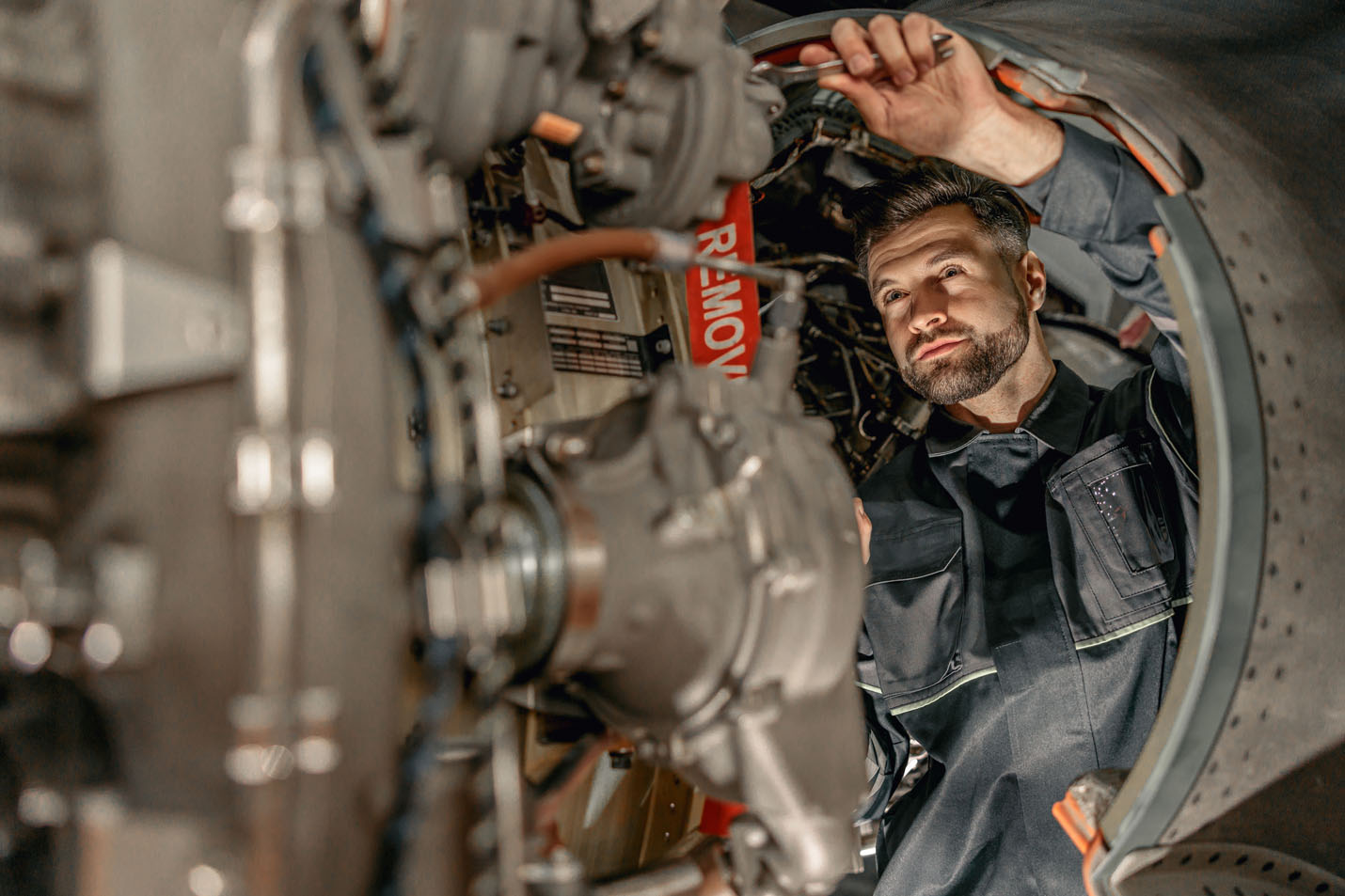 A tech working on an airplane